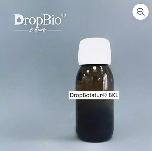 Brown bottle with white cap on a gray background, featuring the DropBio XCLUSIV ORGANICS Bakuchiol Oil brand.
