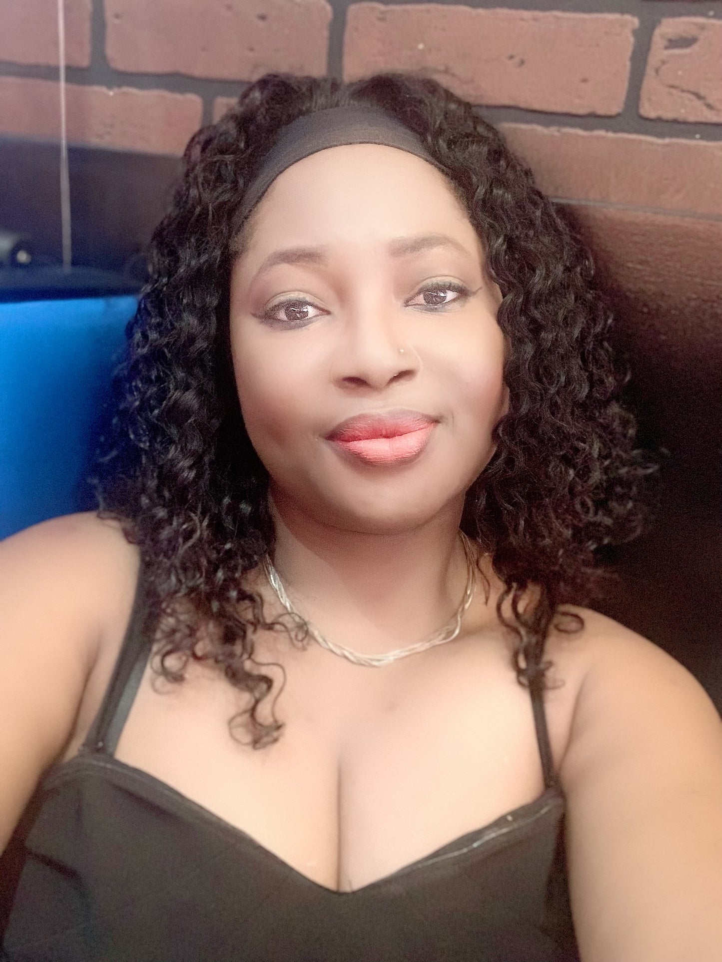 A black woman with lovely clear and glowing skin
